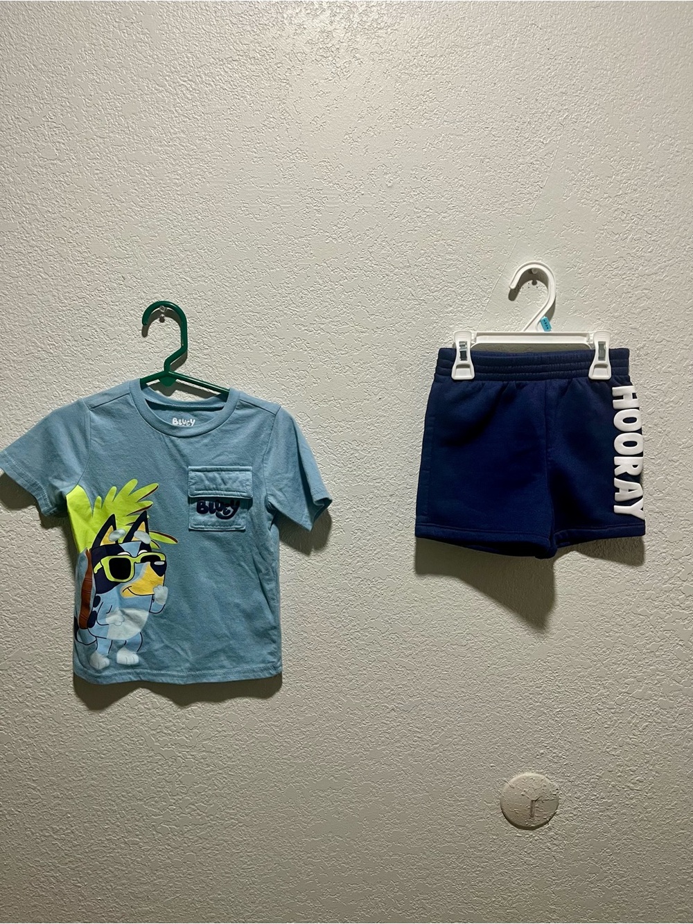 Bluey Light Blue Pocket Tee with Sunglasses Character + Navy 'Hooray' Shorts